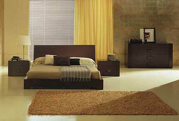 Phòng ngủ dành cho bà sử dụng gam màu ấm áp, nhẹ nhàng, sau cải tạo nhà ống