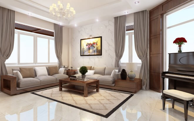 Phòng khách rộng rãi với gam màu trung tính, chất liệu chính là đá và gỗ làm nền, giúp tạo nên phong cách trang nhã hiện đại, sang trọng, trong mẫu thiết kế biệt thự này.