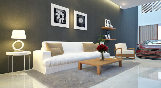 Phòng khách ấn tượng với sơn nhà mảng tường xám được tô điểm thêm bộ sofa trắng kiến tại vẻ hiện đại và chiều sâu cho không gian.
