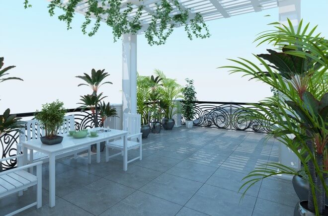 Không gian sân thượng nhà ống thiết kế thoáng mát kết hợp cây xanh tạo phong cảnh và là nơi thư giãn cho các thành viên trong gia đình