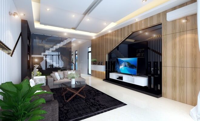 Phòng khách trong mẫu thiết kế nhà ống 5 tầng, phong cách hiện đại với tông màu trung tính hòa nhã, nâu gỗ nhạt, đen và trắng