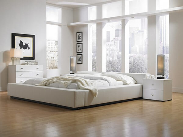 Phòng ngủ nhỏ thiết kế tối giản, sử dụng giường đơn để tiết kiệm diện tích, trong mẫu thiết kế nhà 3 tầng này.