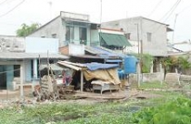 Ách tắc trong thu tiền sử dụng đất vượt hạn mức 