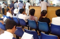 Cán bộ kém, dân chậm có giấy đỏ