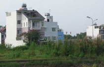 Tháo gỡ vướng mắc trong việc đóng thuế đất ngoài hạn mức