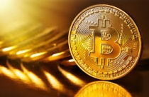 Giá Bitcoin bùng nổ gần 22.000 USD