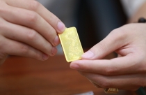 Điểm tin sáng: USD, vàng chịu áp lực giảm giá
