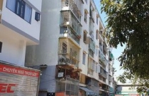 Lô E chung cư 518 Võ Văn Kiệt nghiêng, lún do móng sai kết cấu